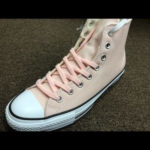 Pink high top Converse
